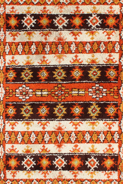 Vintage Moroccan Rug with Stripes & Tribal Design in Orange, D. Brown, Ivory Vintage Moroccan Berber Rug, rug 13 - 1202, country of origin / type: Morocco / Tribal, circa Late - 20th Century. Measures: 6' x 9'. This colorful Vintage Mo... - Keivan Woven Arts13 - 1202 - 5197Rug