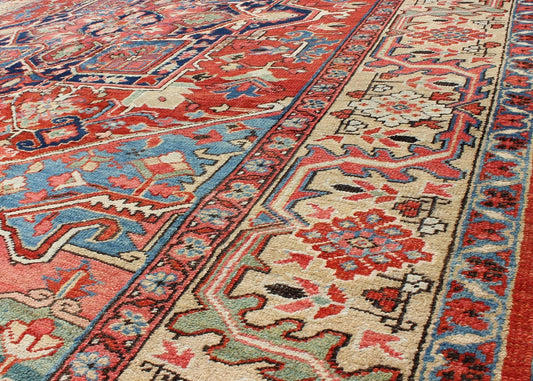 Antique Persian Serapi Rug with Geometric Central Medallion and Colorful Design. Keivan Woven Arts / Rug / 16 - 0305, country of origin / type: Iran /Heriz, circa 1910 Measures: 10' x 12'. This magnificent antique Persian Serapi carpet from the ear... - Keivan Woven Arts16 - 0305 - 8649