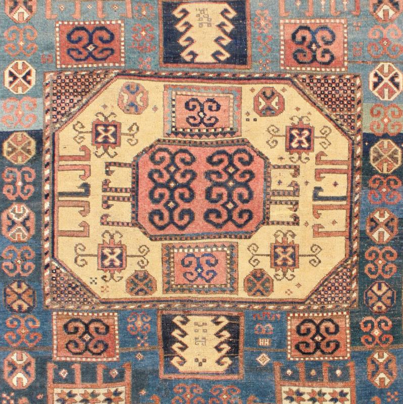 Antique Caucasian Karachopt Rug large rug in Teal and soft Yellow, 16 - 0601, Kazak Karachopf rugs are among the most desirable Caucasian rugs. The muted colors of rusty orange, buttery yellow, blueand ivories that decorate this beautiful antique Karacho... - Keivan Woven Arts16 - 0601 - 7415Rug