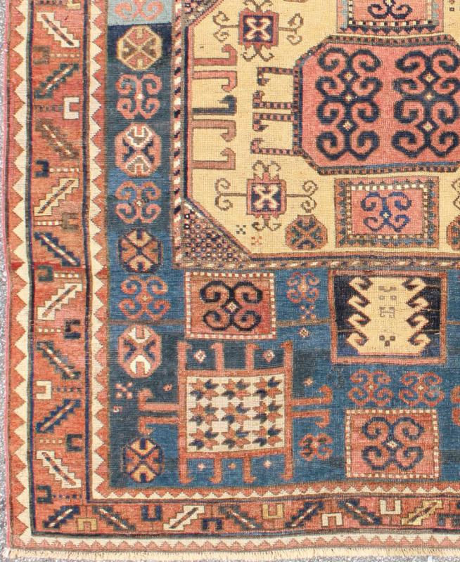 Antique Caucasian Karachopt Rug large rug in Teal and soft Yellow, 16 - 0601, Kazak Karachopf rugs are among the most desirable Caucasian rugs. The muted colors of rusty orange, buttery yellow, blueand ivories that decorate this beautiful antique Karacho... - Keivan Woven Arts16 - 0601 - 7415Rug