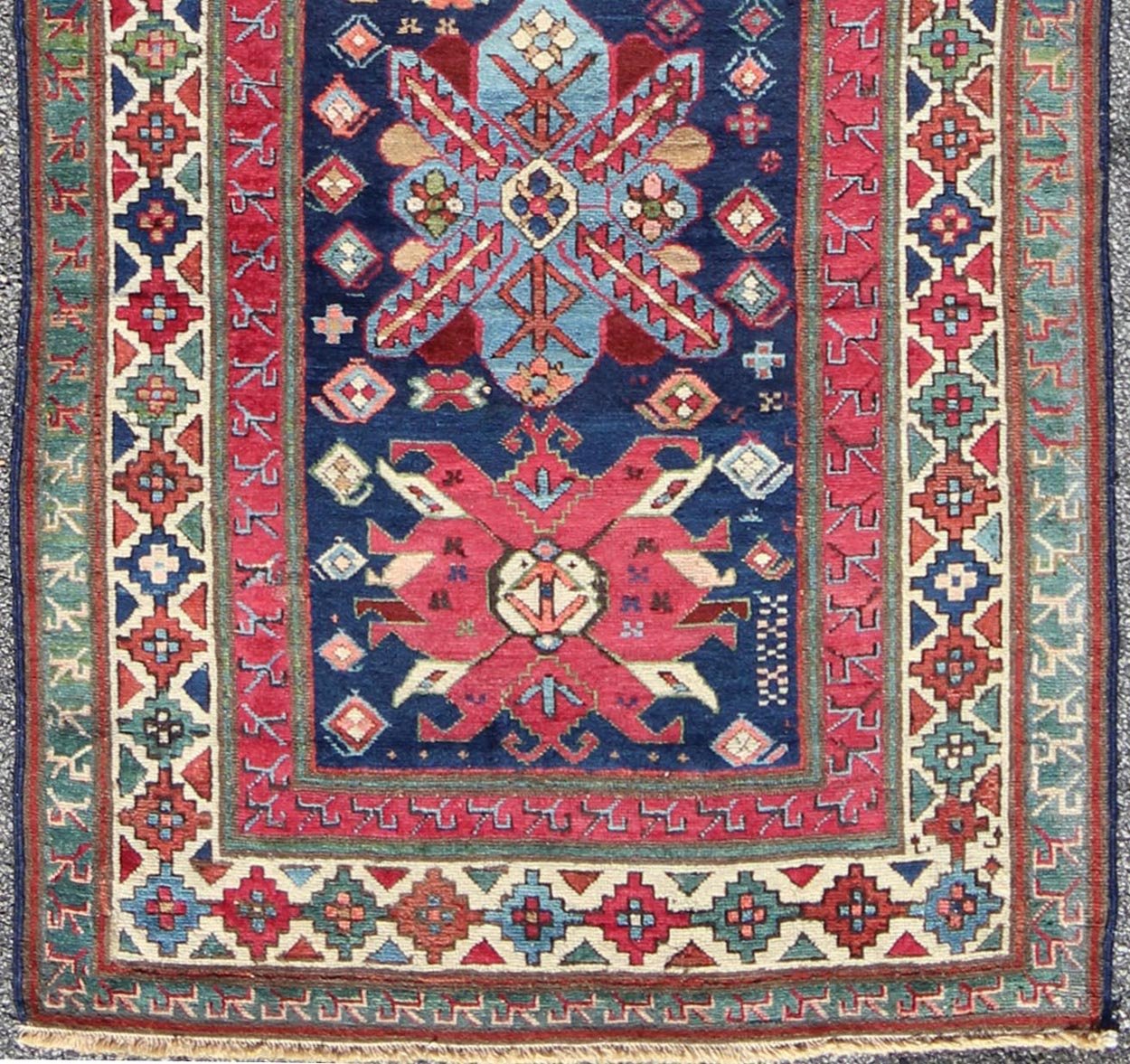 Antique Late 19th Century Kazak Caucasian Runner in Navy Blue Background. Keivan Woven Arts / rug 16 - 0603, country of origin / type: Caucus / Caucasian, circa 1890. Antique Geometric Caucasian Kazak. Measures: 3'6 x 9'9. This antique Caucasian r... - Keivan Woven Arts16 - 0603 - 7419Rug