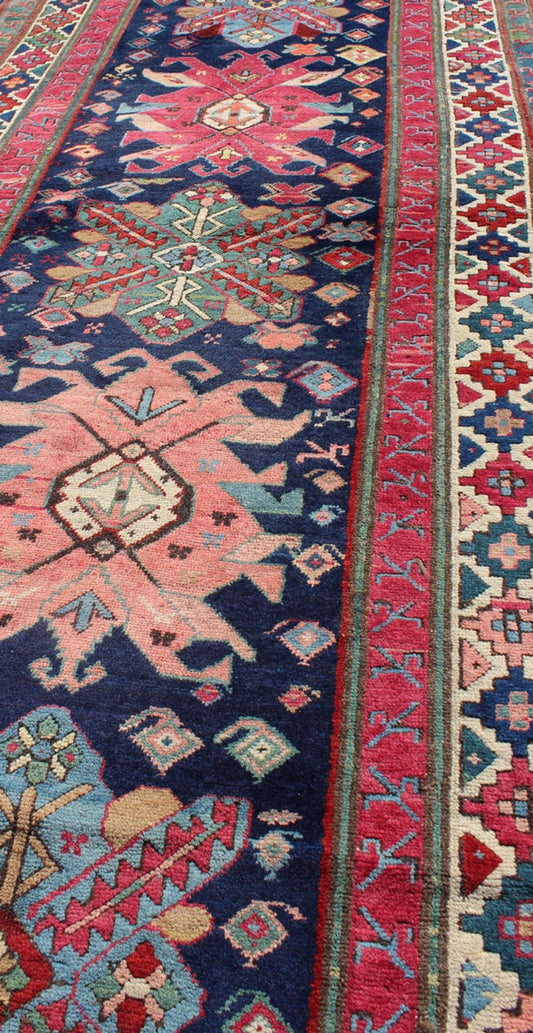 Antique Late 19th Century Kazak Caucasian Runner in Navy Blue Background. Keivan Woven Arts / rug 16 - 0603, country of origin / type: Caucus / Caucasian, circa 1890. Antique Geometric Caucasian Kazak. Measures: 3'6 x 9'9. This antique Caucasian r... - Keivan Woven Arts16 - 0603 - 7419Rug