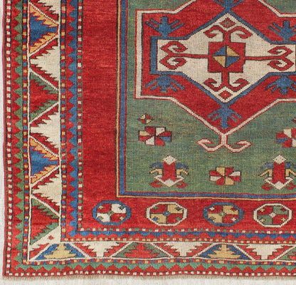 Green Antique Caucasian Fachralo Kazak with Tribal Design in Green, Red and Ivory Antique Caucasian Kazak Rug with Tribal Design in Red, Blue, Green, and Ivory, rug 16 - 0605, country of origin / type: Iran / Caucasian Kazak, circa 1870 Measures: ... - Keivan Woven Arts16 - 0605 - 8662Rug