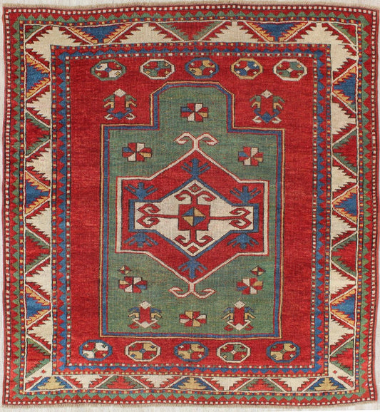 Green Antique Caucasian Fachralo Kazak with Tribal Design in Green, Red and Ivory Antique Caucasian Kazak Rug with Tribal Design in Red, Blue, Green, and Ivory, rug 16 - 0605, country of origin / type: Iran / Caucasian Kazak, circa 1870 Measures: ... - Keivan Woven Arts16 - 0605 - 8662