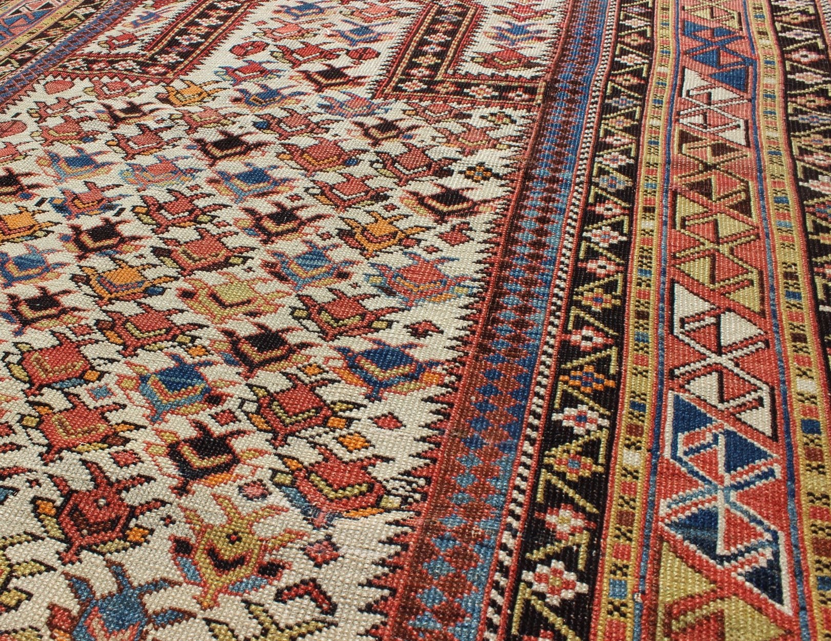 Antique Caucasian Shirvan Rug in Ivory Background, Rust, Yellow, and Dark Brown. Keivan Woven Arts / rug 16 - 0905, country of origin / type: Caucasus / Shirvan, circa late - 19th Century. Measures: 3'8'' x 4'9''. A late 19th century Shirvan prayer r... - Keivan Woven Arts16 - 0905 - 7769Rug