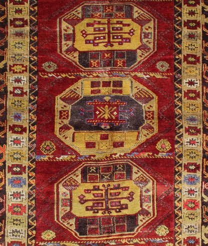 Antique Turkish Kersheihr Medallion Area Runner in Red and Gold Measures: 4'8 x 9'2 This stunning antique Turkish Kersheihr was beautifully handcrafted during the early part of the 20th century. A regal sub - geometric design and five... - Keivan Woven Arts16 - 0909 - 7997Rug