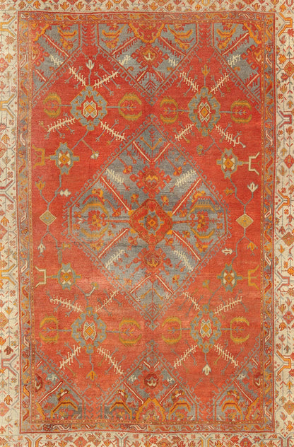 Antique Turkish Oushak rug with tribal Medallion design in terracotta, light gray blue, ivory and gold. Keivan Woven Arts / rug 16 - 0911, country of origin / type: Turkey / Oushak, circa 1900 Measures: 10' x 13'8. This antique Turkish Oushak carpe... - Keivan Woven Arts16 - 0911 - 8678Rug