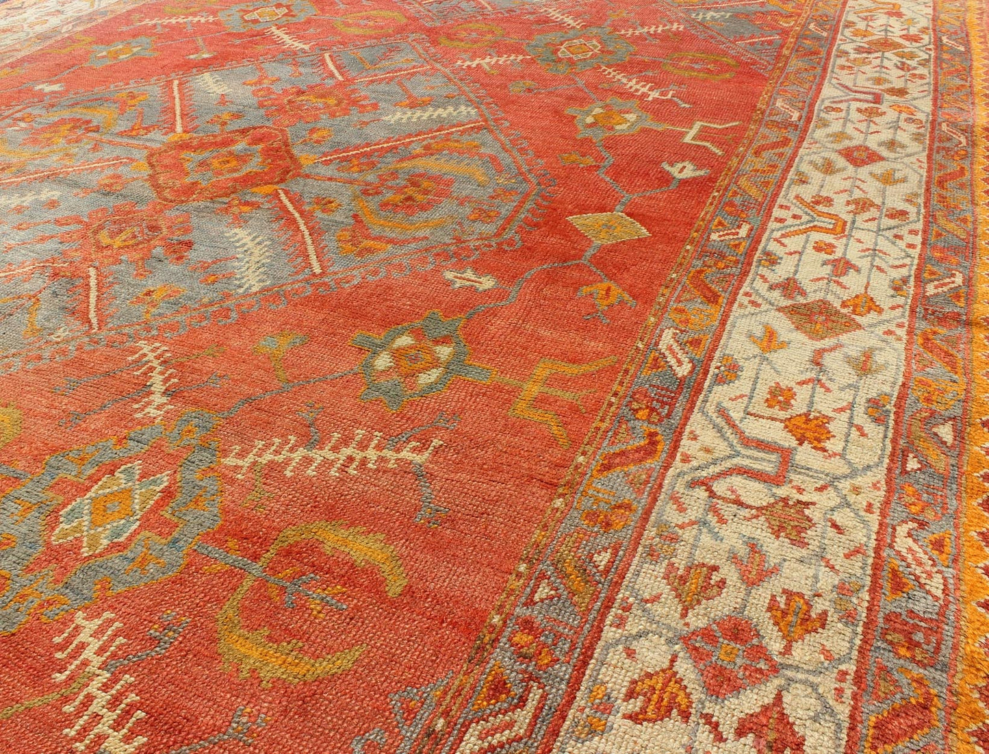 Antique Turkish Oushak rug with tribal Medallion design in terracotta, light gray blue, ivory and gold. Keivan Woven Arts / rug 16 - 0911, country of origin / type: Turkey / Oushak, circa 1900 Measures: 10' x 13'8. This antique Turkish Oushak carpe... - Keivan Woven Arts16 - 0911 - 8678Rug