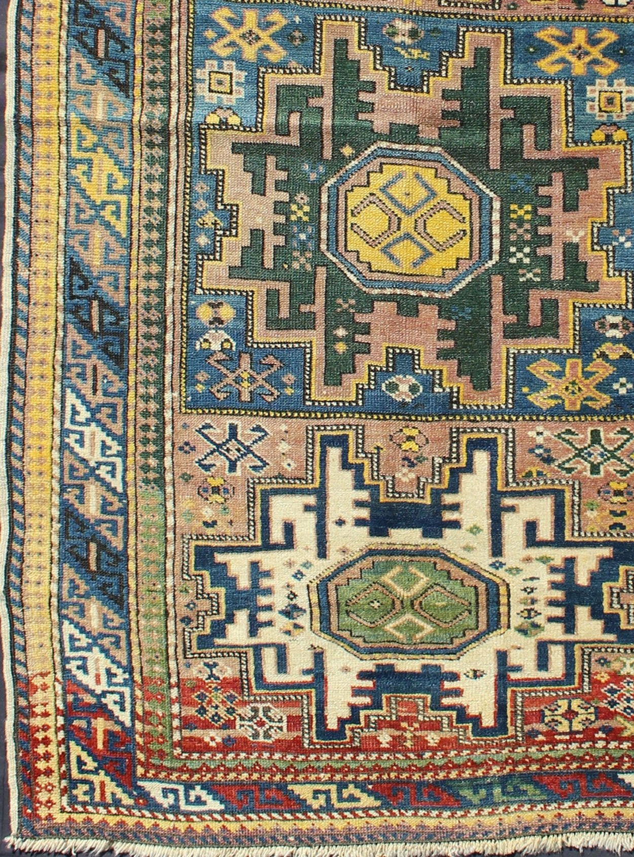 Antique Colorful Kuba Caucasian Rug with Star Medallions in Green, Blue, Yellow. Measures: 3'5'' x 5'7''. Antique Colorful Kuba Caucasian Rug with Star Medallions in Green, Blue, and Yellow, 16 - 0912, This wonderfully colored Kuba rug from th... - Keivan Woven Arts16 - 0912 - 7943Rug