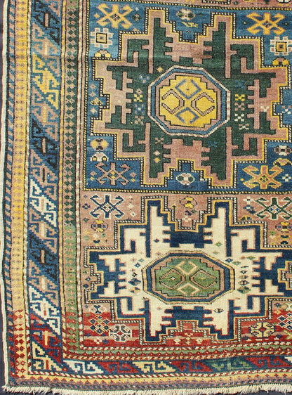 Antique Colorful Kuba Caucasian Rug with Star Medallions in Green, Blue, Yellow. Measures: 3'5'' x 5'7''. Antique Colorful Kuba Caucasian Rug with Star Medallions in Green, Blue, and Yellow, 16 - 0912, This wonderfully colored Kuba rug from th... - Keivan Woven Arts16 - 0912 - 7943Rug