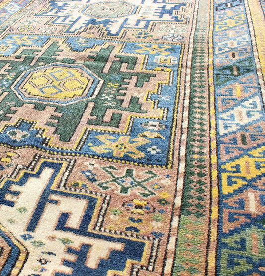 Antique Colorful Kuba Caucasian Rug with Star Medallions in Green, Blue, Yellow. Measures: 3'5'' x 5'7''. Antique Colorful Kuba Caucasian Rug with Star Medallions in Green, Blue, and Yellow, 16 - 0912, This wonderfully colored Kuba rug from th... - Keivan Woven Arts16 - 0912 - 7943Rug