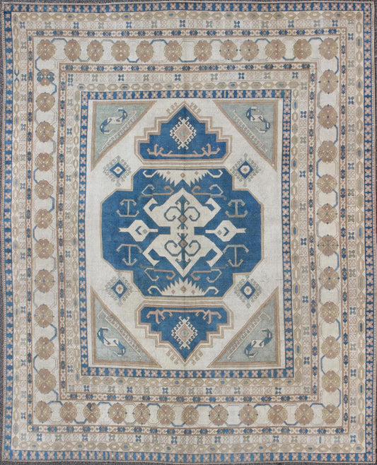 Large vintage Turkish rug with stylized geometric design in blue, ivory, tan. Keivan Woven Arts / rug 16 - 0914, country of origin / type: Turkey / Oushak, circa 1950 Measures: 13' x 15'8. This vintage Turkish Oushak rug features an intricately bea... - Keivan Woven Arts16 - 0914 - 8684
