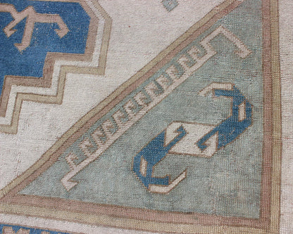 Large vintage Turkish rug with stylized geometric design in blue, ivory, tan. Keivan Woven Arts / rug 16 - 0914, country of origin / type: Turkey / Oushak, circa 1950 Measures: 13' x 15'8. This vintage Turkish Oushak rug features an intricately bea... - Keivan Woven Arts16 - 0914 - 8684Rug