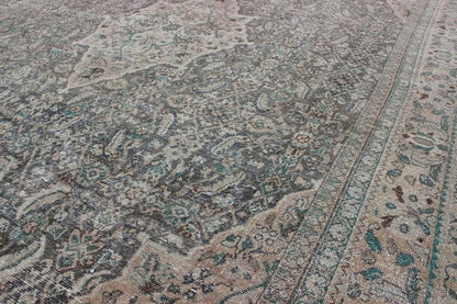 Antique Persian Mahal Rug with Floral Design in Light Gray, Green, Blush/Pink and Light Brown Colors Measures: 10'5 x 13'4 This antique Persian Mahal rug with an understated medallion design has been distressed and features a unique color... - Keivan Woven Arts16 - 0918 - 8295Rug