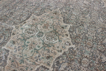 Antique Persian Mahal Rug with Floral Design in Light Gray, Green, Blush/Pink and Light Brown Colors Measures: 10'5 x 13'4 This antique Persian Mahal rug with an understated medallion design has been distressed and features a unique color... - Keivan Woven Arts16 - 0918 - 8295Rug
