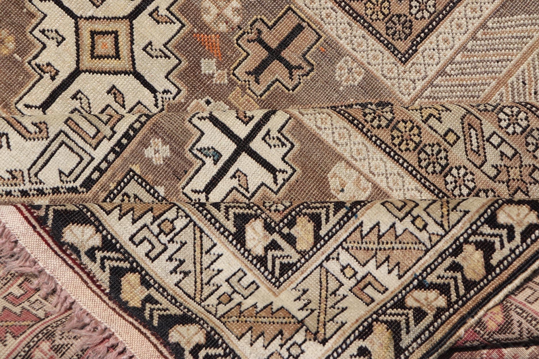 Antique Tribal Caucasian Rug with All - Over Motif in Muted Neutrals. Country of Origin: Caucasus; Type: Caucasian; Design: Tribal; Keivan Woven Arts: rug 16 - 0922. Measures: 3'10 x 4'5 The field of this Caucasian piece features all - over tribal... - Keivan Woven Arts16 - 0922 - 7929Rug