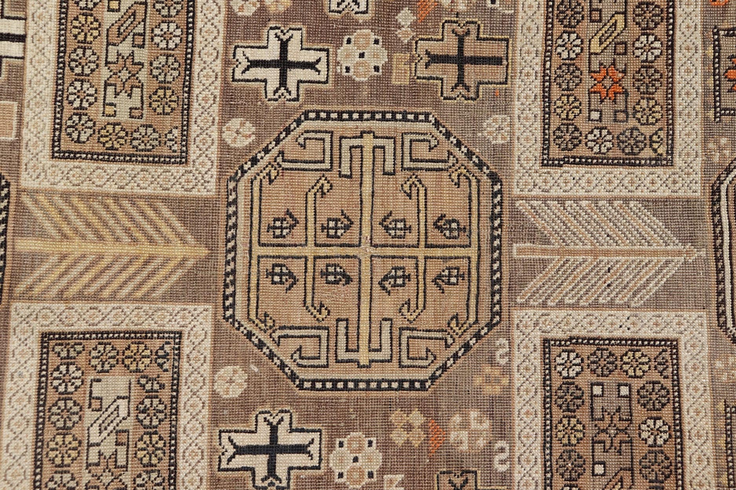 Antique Tribal Caucasian Rug with All - Over Motif in Muted Neutrals. Country of Origin: Caucasus; Type: Caucasian; Design: Tribal; Keivan Woven Arts: rug 16 - 0922. Measures: 3'10 x 4'5 The field of this Caucasian piece features all - over tribal... - Keivan Woven Arts16 - 0922 - 7929Rug