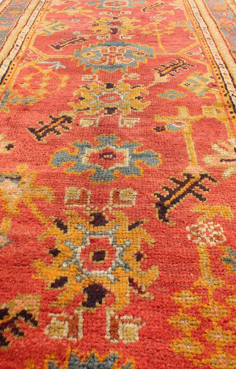 Red and tan and multi colors antique Turkish Oushak runner with sub - geometric tribal motifs, rug 16 - 1002, country of origin / type: Turkey / Oushak, circa 1910 This antique Oushak runner features a unique blend of cheerful colors and an intricat... - Keivan Woven Arts16 - 1002 - 8694Rug