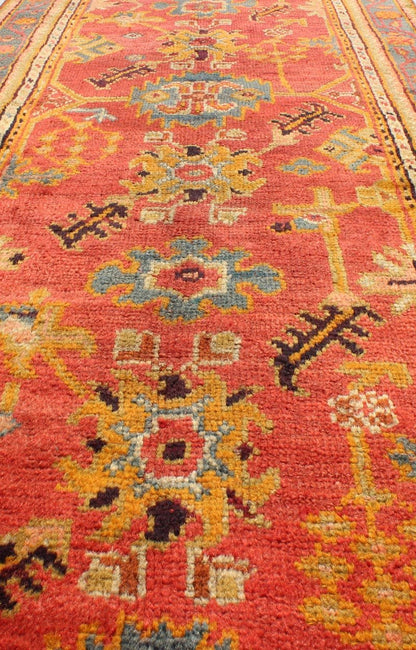 Red and tan and multi colors antique Turkish Oushak runner with sub - geometric tribal motifs, rug 16 - 1002, country of origin / type: Turkey / Oushak, circa 1910 This antique Oushak runner features a unique blend of cheerful colors and an intricat... - Keivan Woven Arts16 - 1002 - 8694Rug