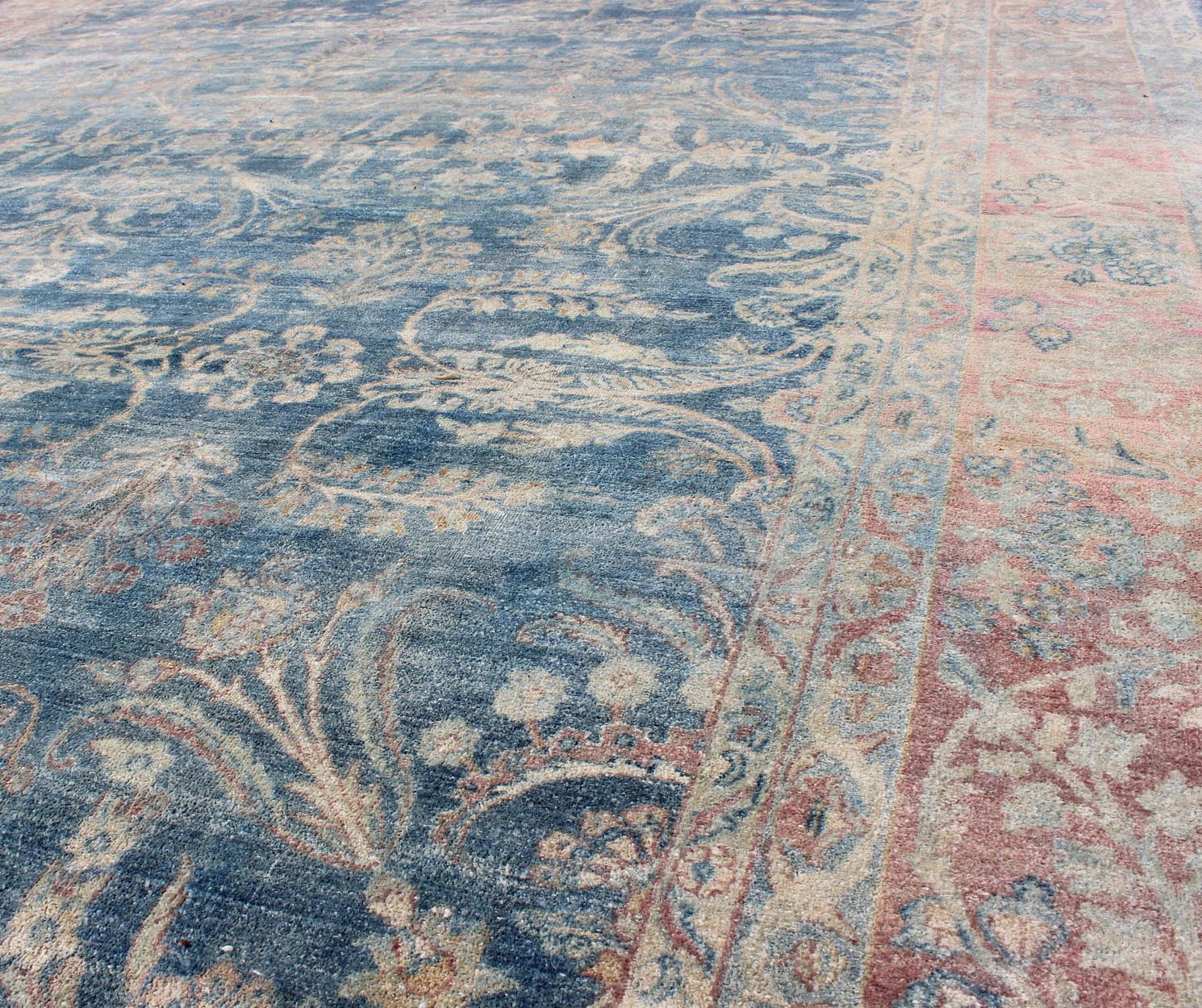 Antique Persian Kerman Rug with Paisley and Floral Motifs in Blue Field and Pink Antique Hand Knotted Persian Kerman rug with Paisley and floral motifs on blue field, Keivan Woven Arts / rug 16 - 1003, country of origin / type: Iran / Kerman, circ... - Keivan Woven Arts16 - 1003 - 8631Rug