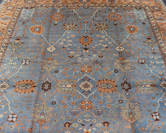 Keivan Woven Arts Antique Turkish All Over Oushak Rug in Blue Background & light Cognac Colored Border . Keivan Woven Arts / rug 16 - 1006, country of origin / type: Turkey / Oushak, circa Early - 20th Century. Antique Turkish All Over Oushak Rug in Blue B... - Keivan Woven Arts16 - 1006 - 8141Rug