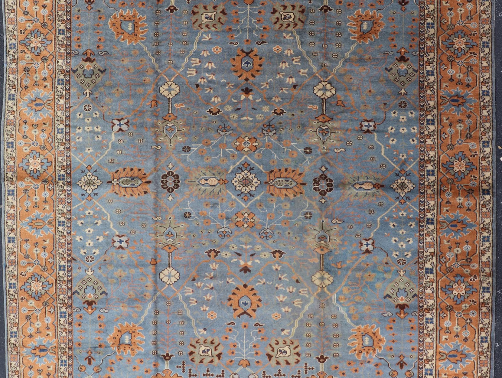 Keivan Woven Arts Antique Turkish All Over Oushak Rug in Blue Background & light Cognac Colored Border . Keivan Woven Arts / rug 16 - 1006, country of origin / type: Turkey / Oushak, circa Early - 20th Century. Antique Turkish All Over Oushak Rug in Blue B... - Keivan Woven Arts16 - 1006 - 8141Rug