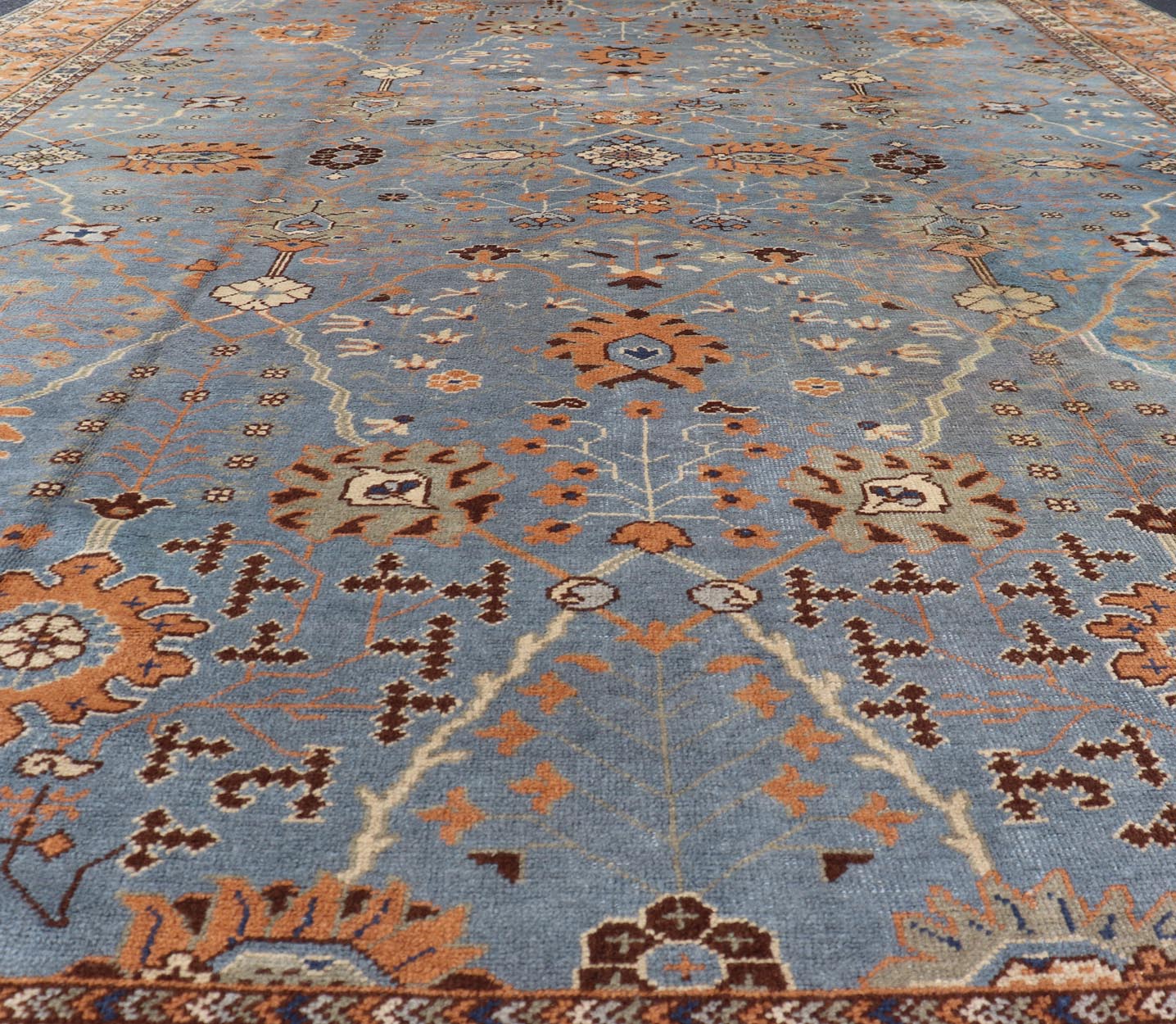 Keivan Woven Arts Antique Turkish All Over Oushak Rug in Blue Background & light Cognac Colored Border . Keivan Woven Arts / rug 16 - 1006, country of origin / type: Turkey / Oushak, circa Early - 20th Century. Antique Turkish All Over Oushak Rug in Blue B... - Keivan Woven Arts16 - 1006 - 8141Rug