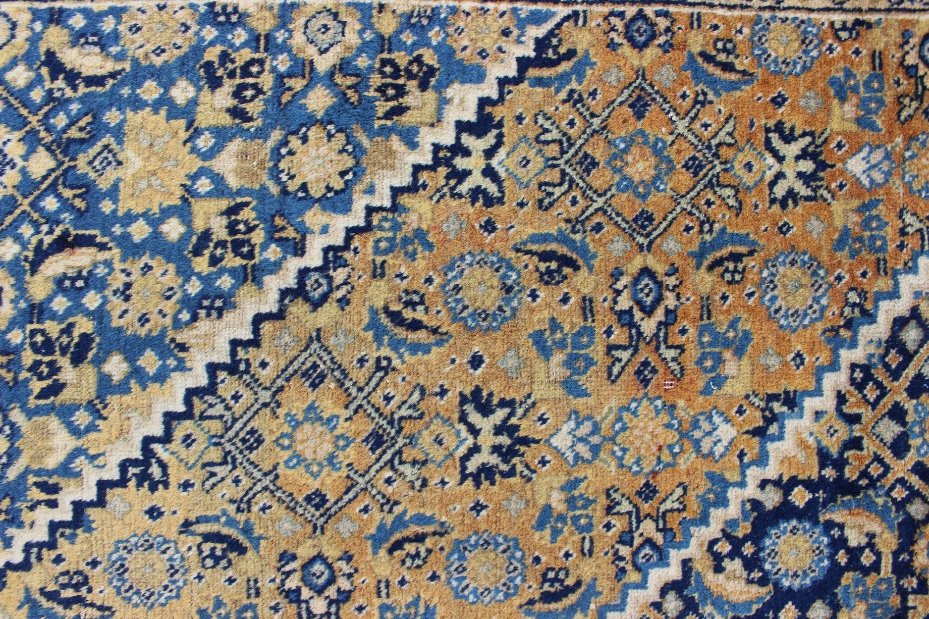 Antique Persian Tabriz Rug with Medallion And A Variety of Blue's and Gold's. Keivan Woven Arts / Rug / 16 - 1205, country of origin / type: Iran / Tabriz, circa 1920. Classic geometric Tabriz. Measures: 9'3 x 12'5. This antique Persian Tabriz rug ... - Keivan Woven Arts16 - 1205 - 8151Rug