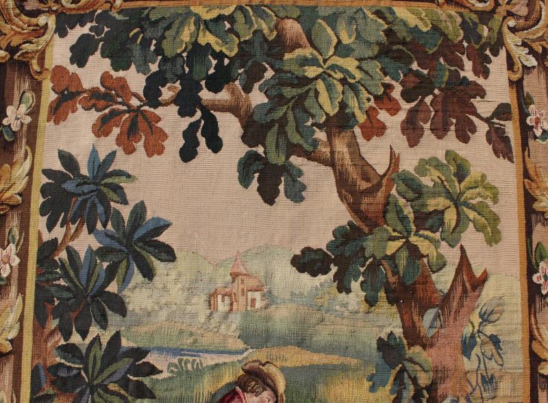Antique French Aubusson Tapestry with Woodland Scene Surrounded by Floral Border This enchanting antique Aubusson tapestry beautifully illustrates the remarkable sense of depth and richness that was perfected by French artisans of the 19th centu... - Keivan Woven Arts17 - 0102 - 8157Rug