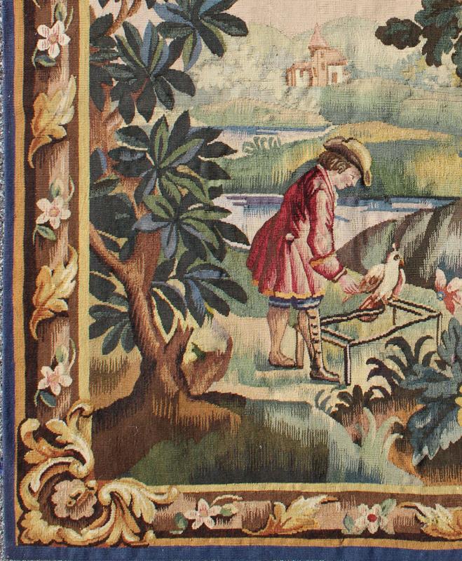 Antique French Aubusson Tapestry with Woodland Scene Surrounded by Floral Border This enchanting antique Aubusson tapestry beautifully illustrates the remarkable sense of depth and richness that was perfected by French artisans of the 19th centu... - Keivan Woven Arts17 - 0102 - 8157Rug