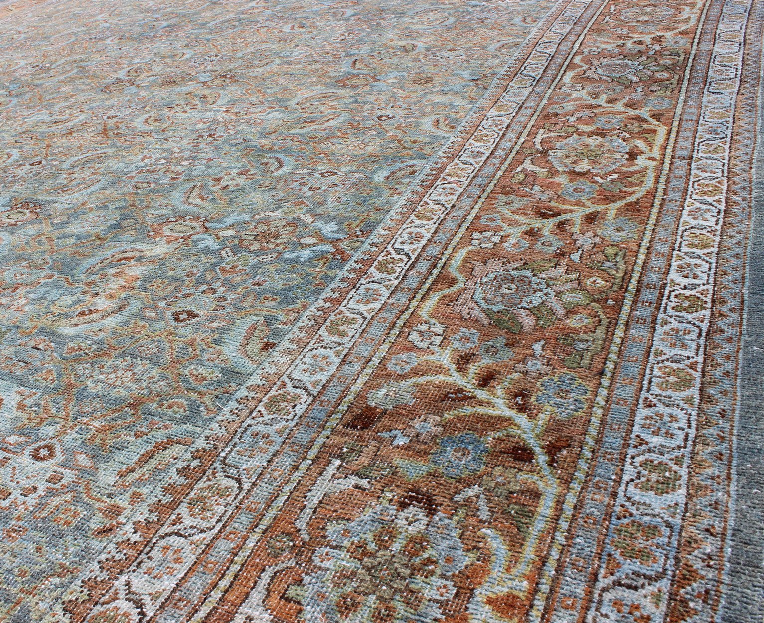 Antique Persian Sultanabad rug with all - over design in light blue and burnt orange, rug 17 - 0104, country of origin / type: Iran / Sultanabad, circa 1900 This beautiful and large antique Persian Sultanabad rug displays a gorgeous, all - over Sub - ge... - Keivan Woven Arts17 - 0104 - 8714Rug