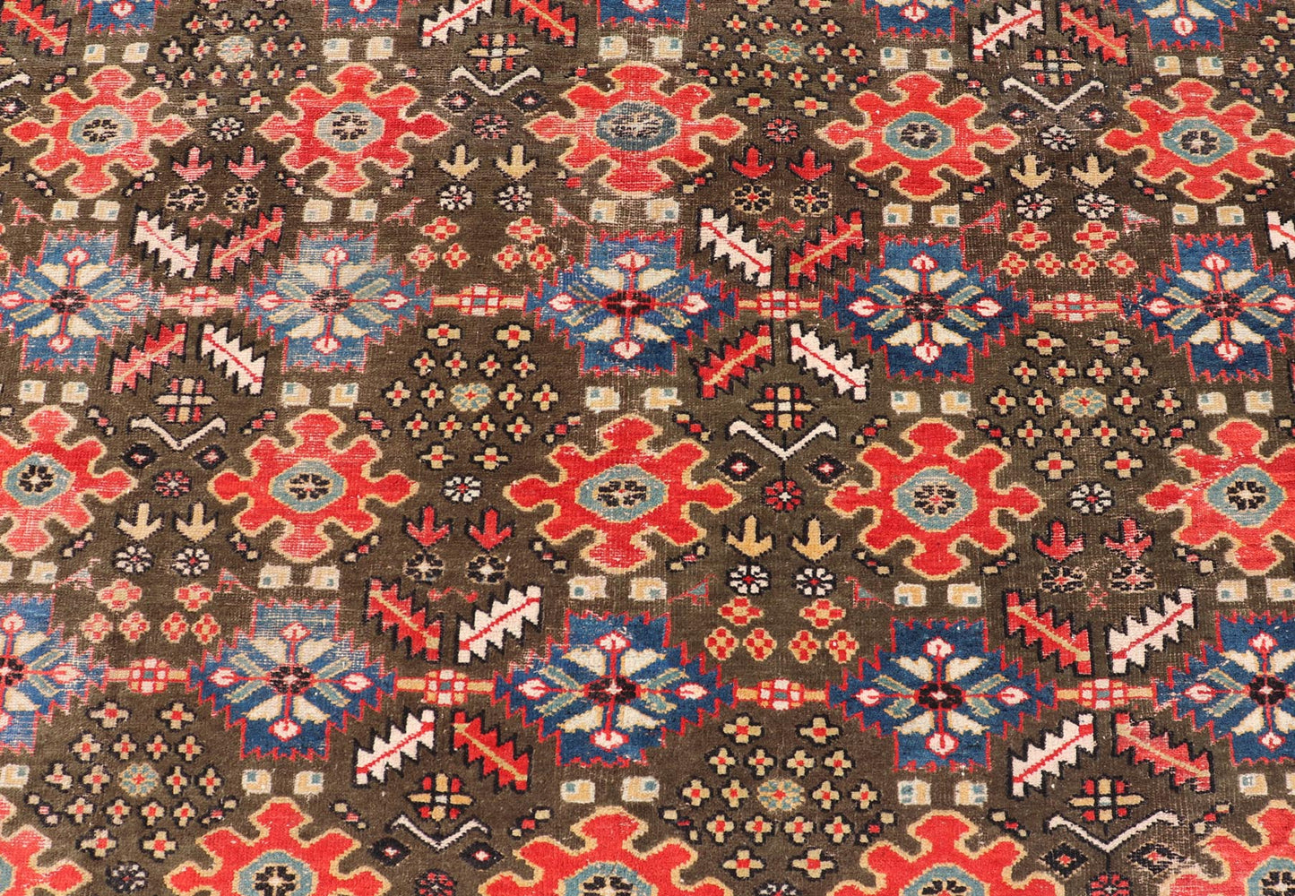 Antique Kurdish rug with brown, red, and blue geometric floral design. Keivan Woven Arts / rug 17 - 0201, country of origin / type: Iran / Kurdish, Early 19th Century, possible late 18th century. Measures: 12'3 x 17'6. This 19th century antique K... - Keivan Woven Arts17 - 0201 - 8205Rug
