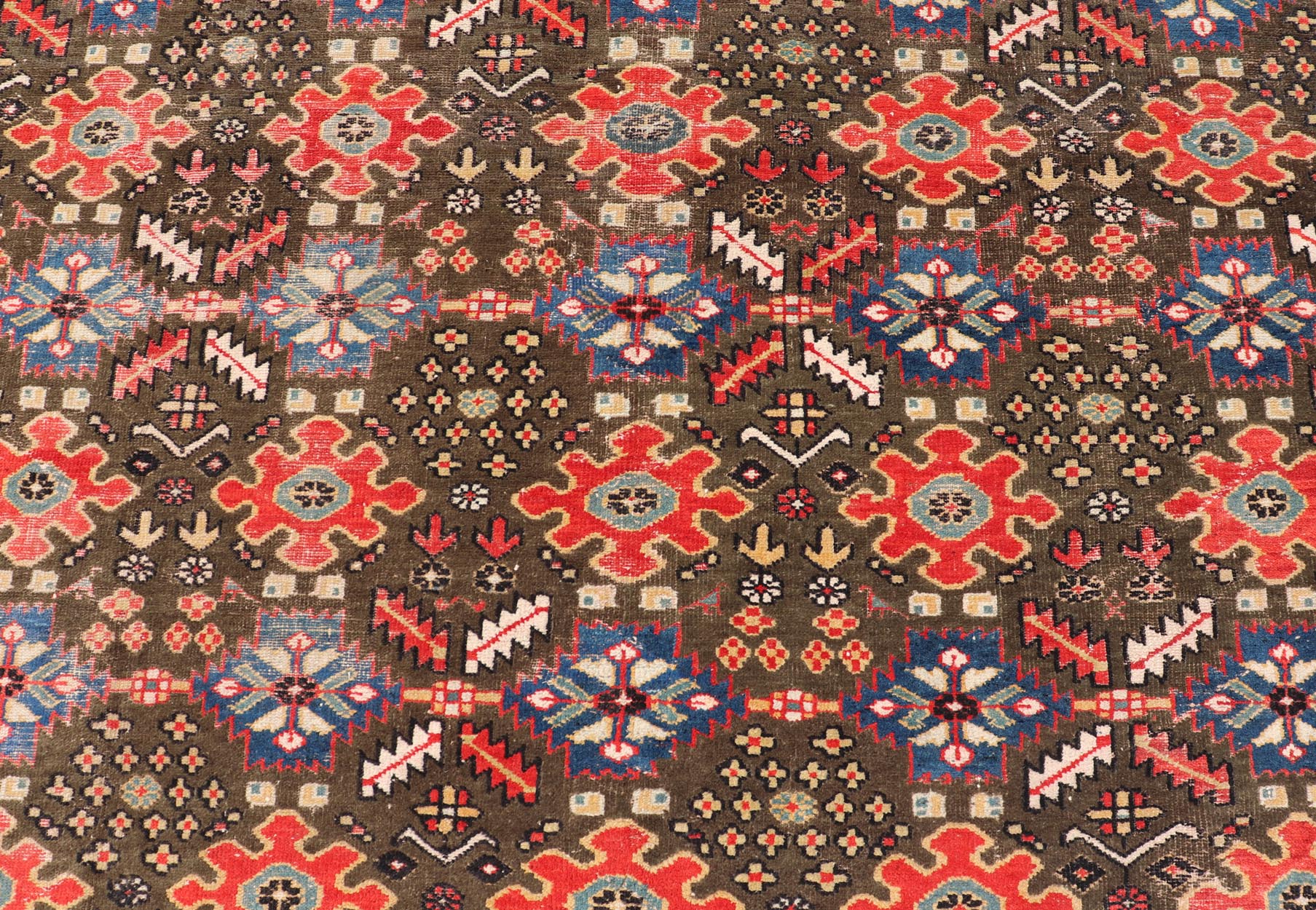 Antique Kurdish rug with brown, red, and blue geometric floral design. Keivan Woven Arts / rug 17 - 0201, country of origin / type: Iran / Kurdish, Early 19th Century, possible late 18th century. Measures: 12'3 x 17'6. This 19th century antique K... - Keivan Woven Arts17 - 0201 - 8205Rug