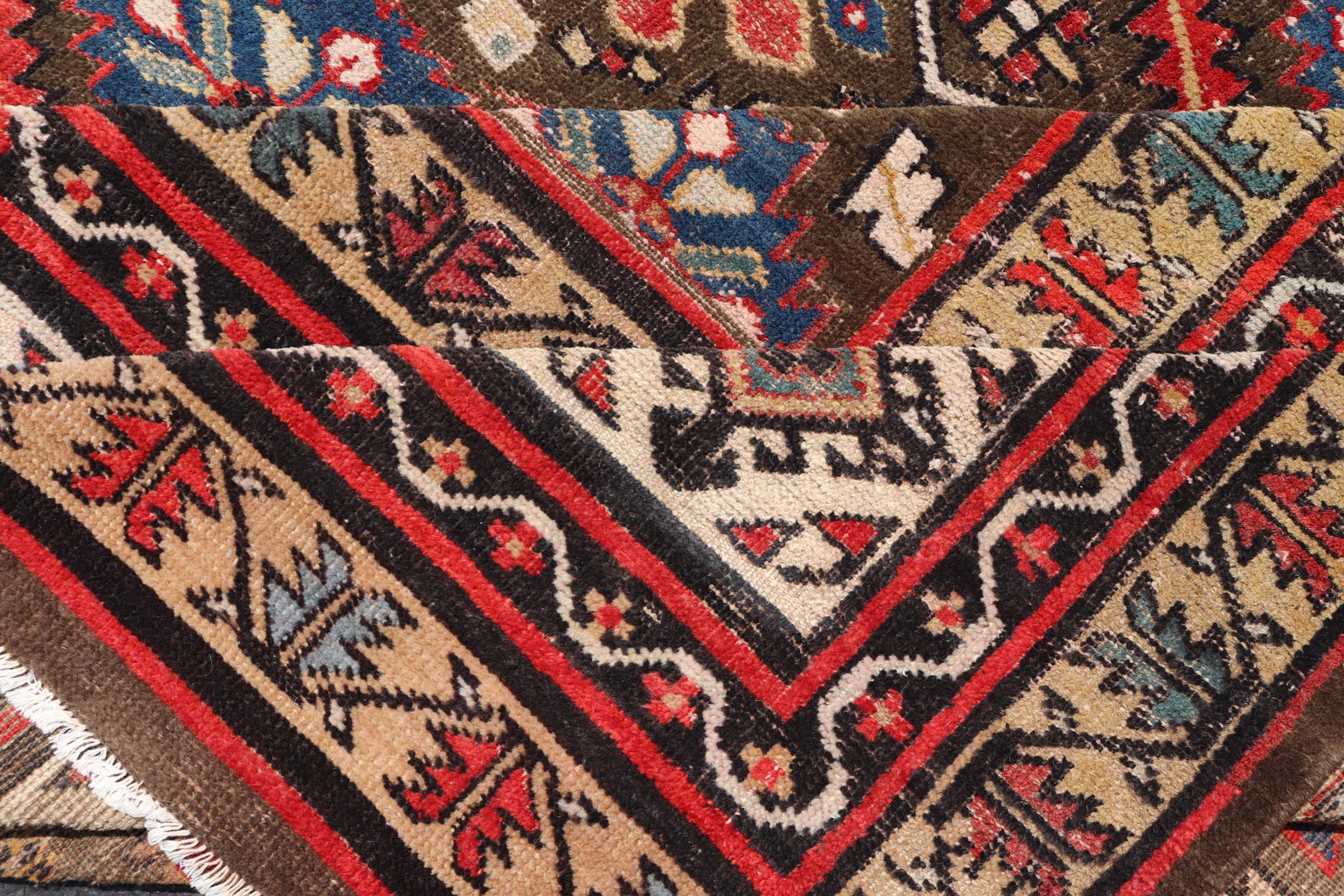 Antique Kurdish rug with brown, red, and blue geometric floral design. Keivan Woven Arts / rug 17 - 0201, country of origin / type: Iran / Kurdish, Early 19th Century, possible late 18th century. Measures: 12'3 x 17'6. This 19th century antique K... - Keivan Woven Arts17 - 0201 - 8205Rug