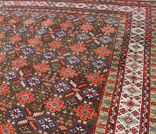 Antique Kurdish rug with brown, red, and blue geometric floral design. Keivan Woven Arts / rug 17 - 0201, country of origin / type: Iran / Kurdish, Early 19th Century, possible late 18th century. Measures: 12'3 x 17'6. This 19th century antique K... - Keivan Woven Arts17 - 0201 - 8205Rug