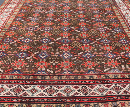 Antique Kurdish rug with brown, red, and blue geometric floral design. Keivan Woven Arts / rug 17 - 0201, country of origin / type: Iran / Kurdish, Early 19th Century, possible late 18th century. Measures: 12'3 x 17'6. This 19th century antique K... - Keivan Woven Arts17 - 0201 - 8205Rug
