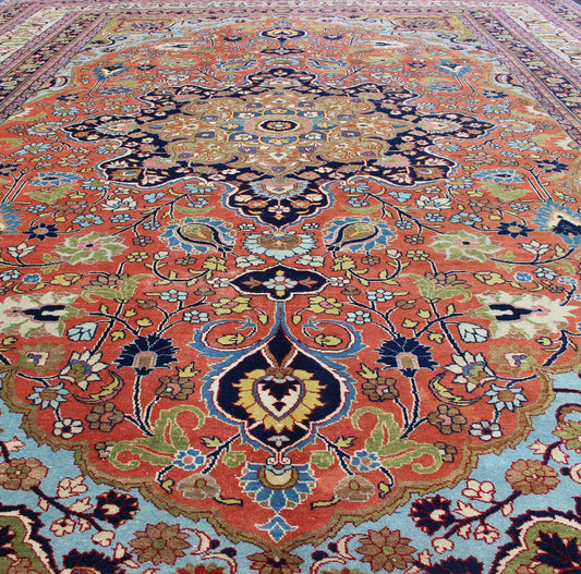 Finely woven antique Tabriz rug with circular, script - style medallion and orange field, Keivan Woven Arts/ rug / 17 - 0304. Classic Persian rug, traditional Persian rug, traditional Tabriz. Measures: 10'1 x 14'2 This spectacular and colorful Persia... - Keivan Woven Arts17 - 0304 - 8453Rug
