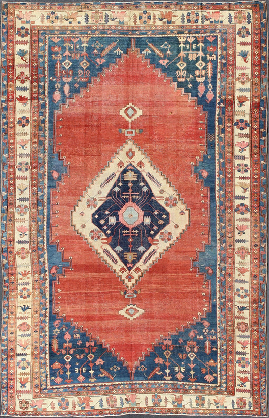 19th century Tribal antique Persian Bakshaiesh rug in red and blue. Keivan Woven Arts / rug 17 - 0402, country of origin / type: Iran / Bakshaiesh, circa 1880. Antique Persian Bakhshaiesh rug with a geometric Serapi medallion Measures:11'9 x 17'2. ... - Keivan Woven Arts17 - 0402 - 8728Rug