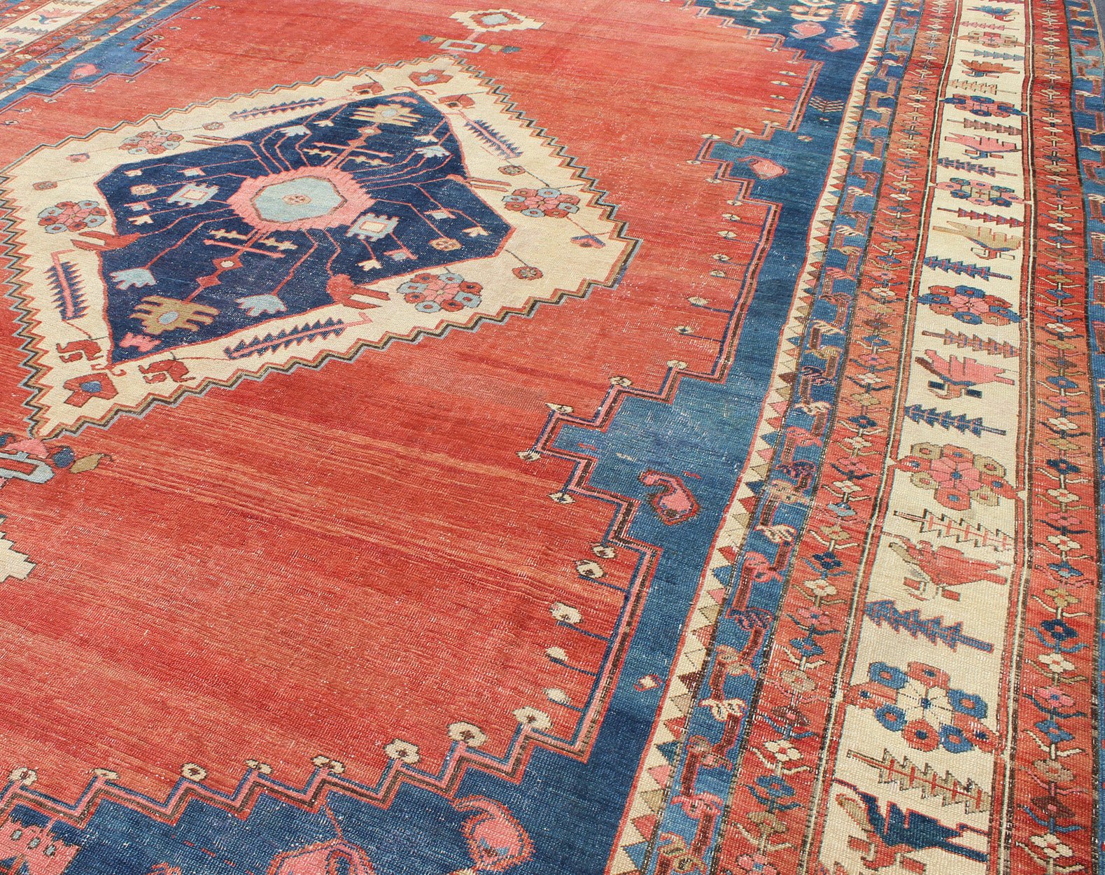 19th century Tribal antique Persian Bakshaiesh rug in red and blue. Keivan Woven Arts / rug 17 - 0402, country of origin / type: Iran / Bakshaiesh, circa 1880. Antique Persian Bakhshaiesh rug with a geometric Serapi medallion Measures:11'9 x 17'2. ... - Keivan Woven Arts17 - 0402 - 8728Rug