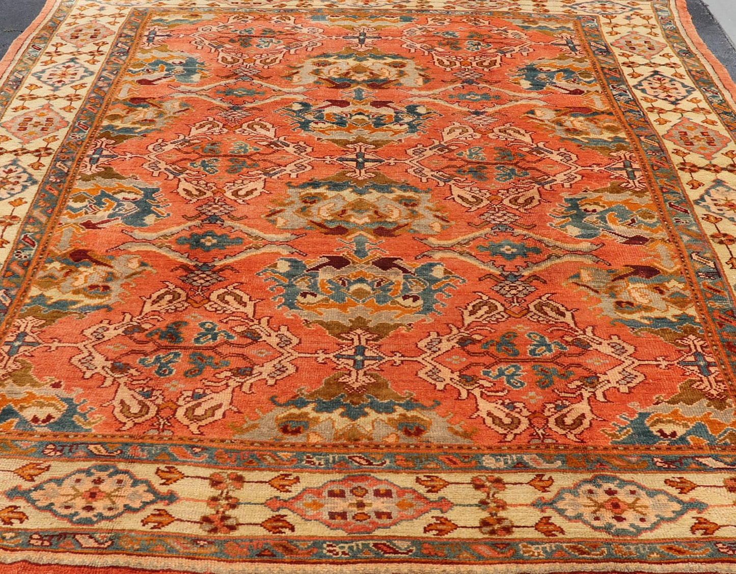 Antique Turkish Oushak rug with Large Scale sub floral design in light tangerine/terracotta background. Keivan Woven Arts / rug 17 - 0605, country of origin / type: Turkey / Oushak, circa 1910. Measures: 10'6 x 14'6. This antique Turkish Oushak ca... - Keivan Woven Arts17 - 0605 - 8739