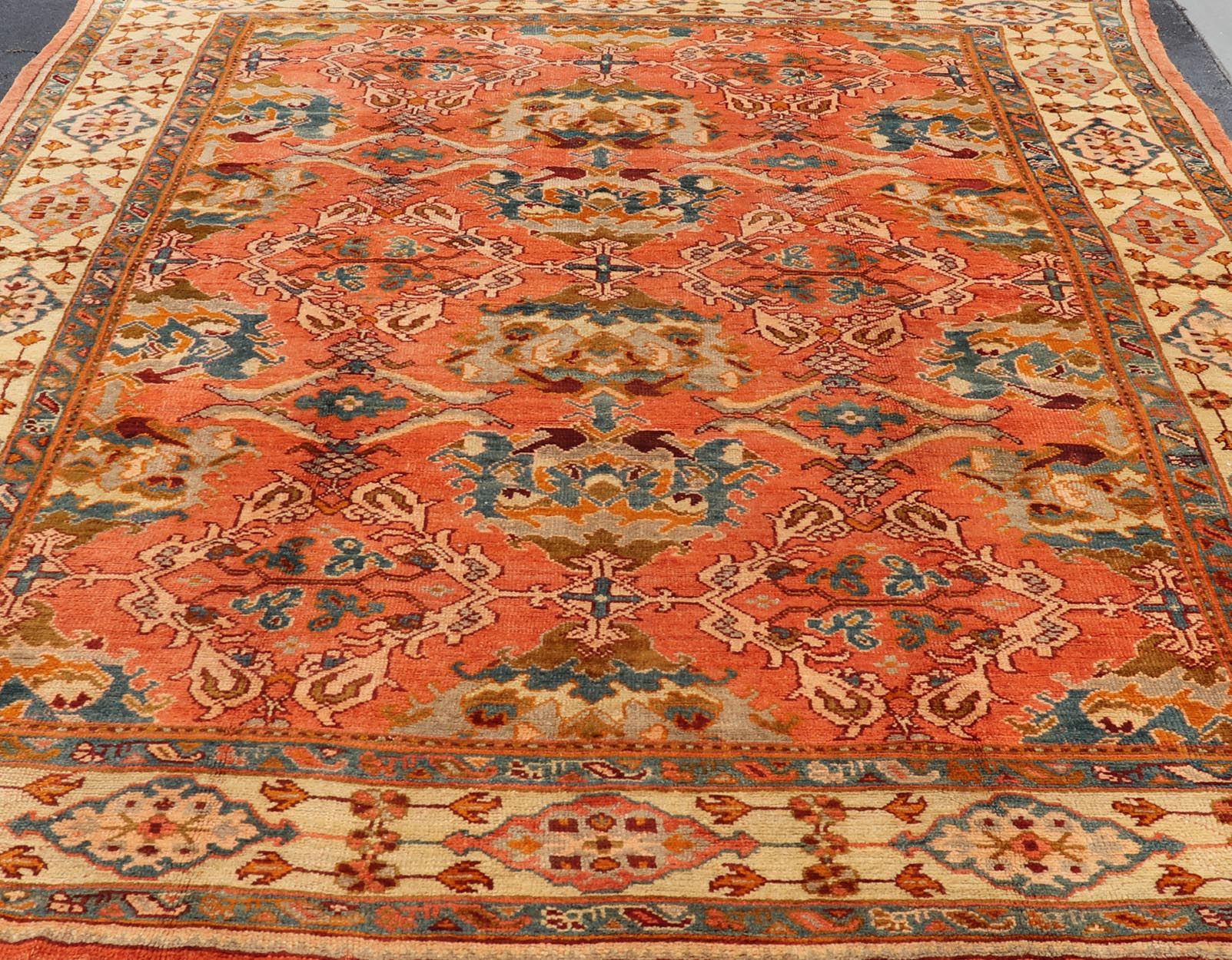 Antique Turkish Oushak rug with Large Scale sub floral design in light tangerine/terracotta background. Keivan Woven Arts / rug 17 - 0605, country of origin / type: Turkey / Oushak, circa 1910. Measures: 10'6 x 14'6. This antique Turkish Oushak ca... - Keivan Woven Arts17 - 0605 - 8739