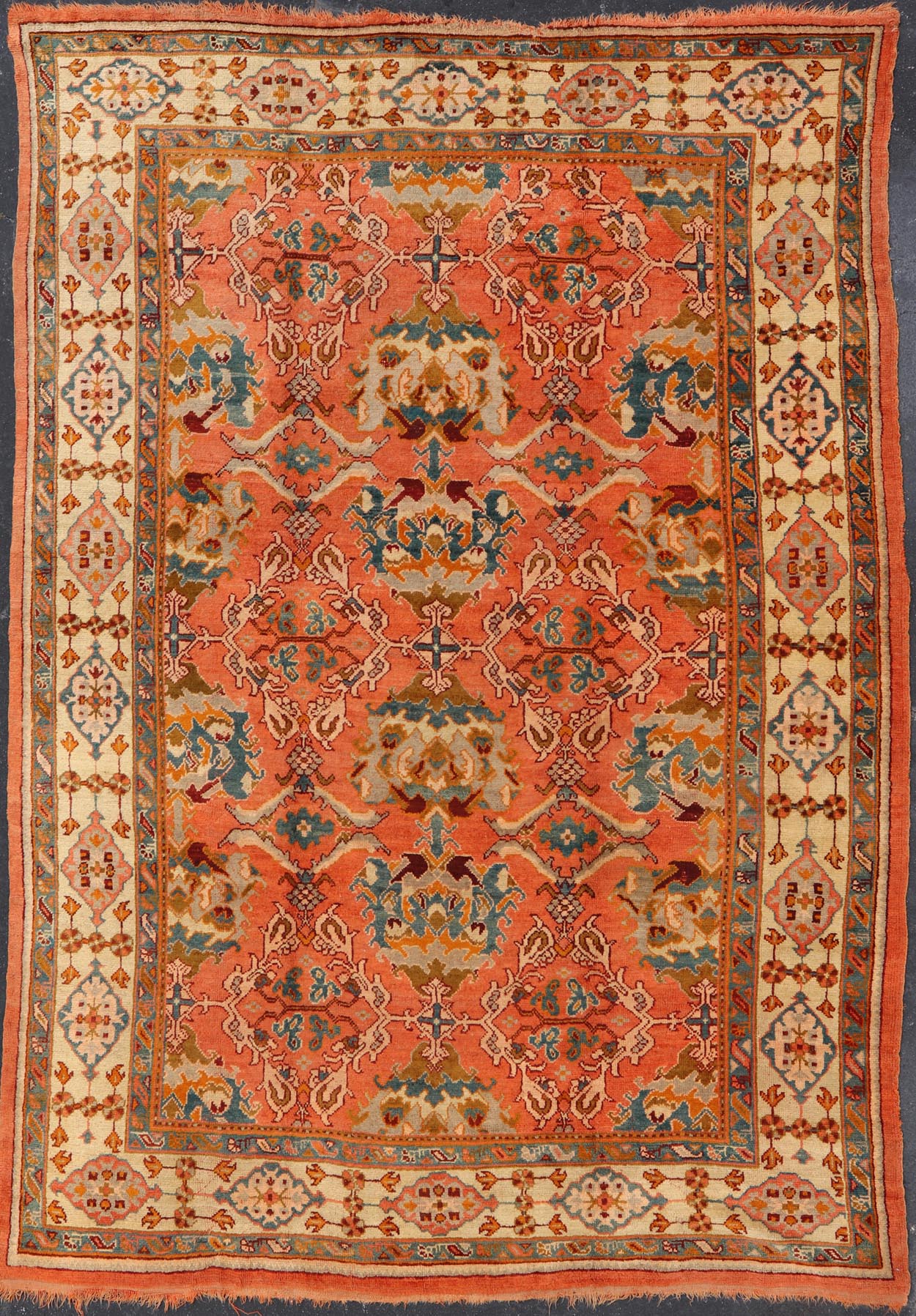 Antique Turkish Oushak rug with Large Scale sub floral design in light tangerine/terracotta background. Keivan Woven Arts / rug 17 - 0605, country of origin / type: Turkey / Oushak, circa 1910. Measures: 10'6 x 14'6. This antique Turkish Oushak ca... - Keivan Woven Arts17 - 0605 - 8739Rug