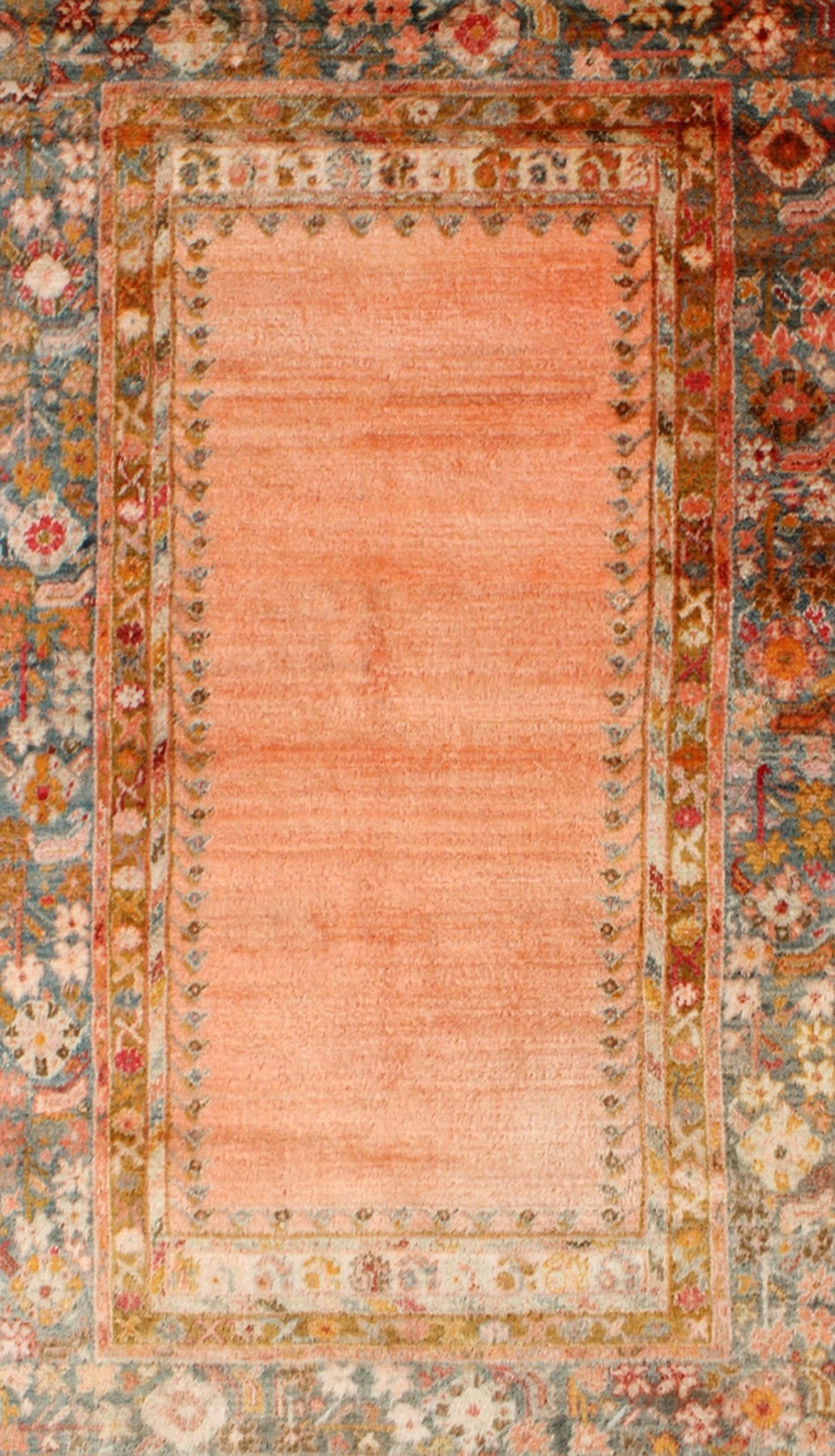 Antique Angora wool Oushak rug with empty salmon field and intricate borders, rug 17 - 0706, country of origin/type: Turkey/Oushak, circa 1900. This antique Turkish rug (circa 1900) features a relatively intricate and detailed border area and an a... - Keivan Woven Arts17 - 0706 - 8753Rug