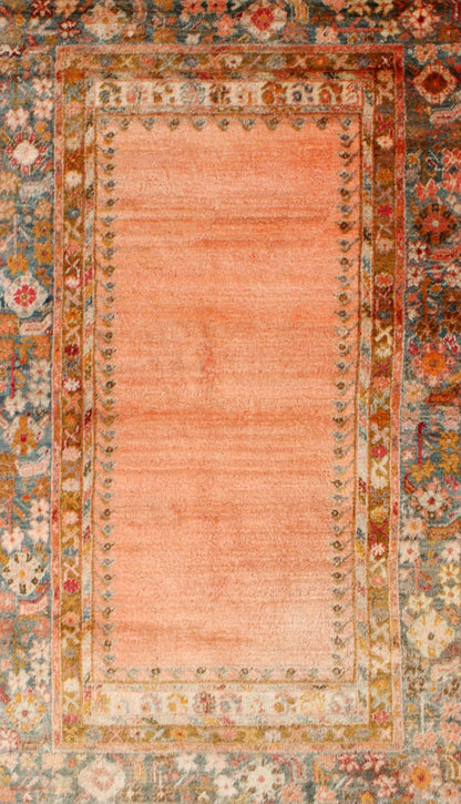 Antique Angora wool Oushak rug with empty salmon field and intricate borders, rug 17 - 0706, country of origin/type: Turkey/Oushak, circa 1900. This antique Turkish rug (circa 1900) features a relatively intricate and detailed border area and an a... - Keivan Woven Arts17 - 0706 - 8753Rug