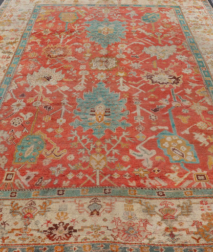 Antique Turkish Oushak In Tribal Motifs in Soft Coral, Blue, Marigold, and Cream Antique Turkish Oushak rug with tribal Medallion design in terracotta, blue, cream, and marigold. Keivan Woven Arts / rug / 17 - 1108 - K - 105, country of origin / type:... - Keivan Woven Arts17 - 1108 - K - 105 - 9272Rug