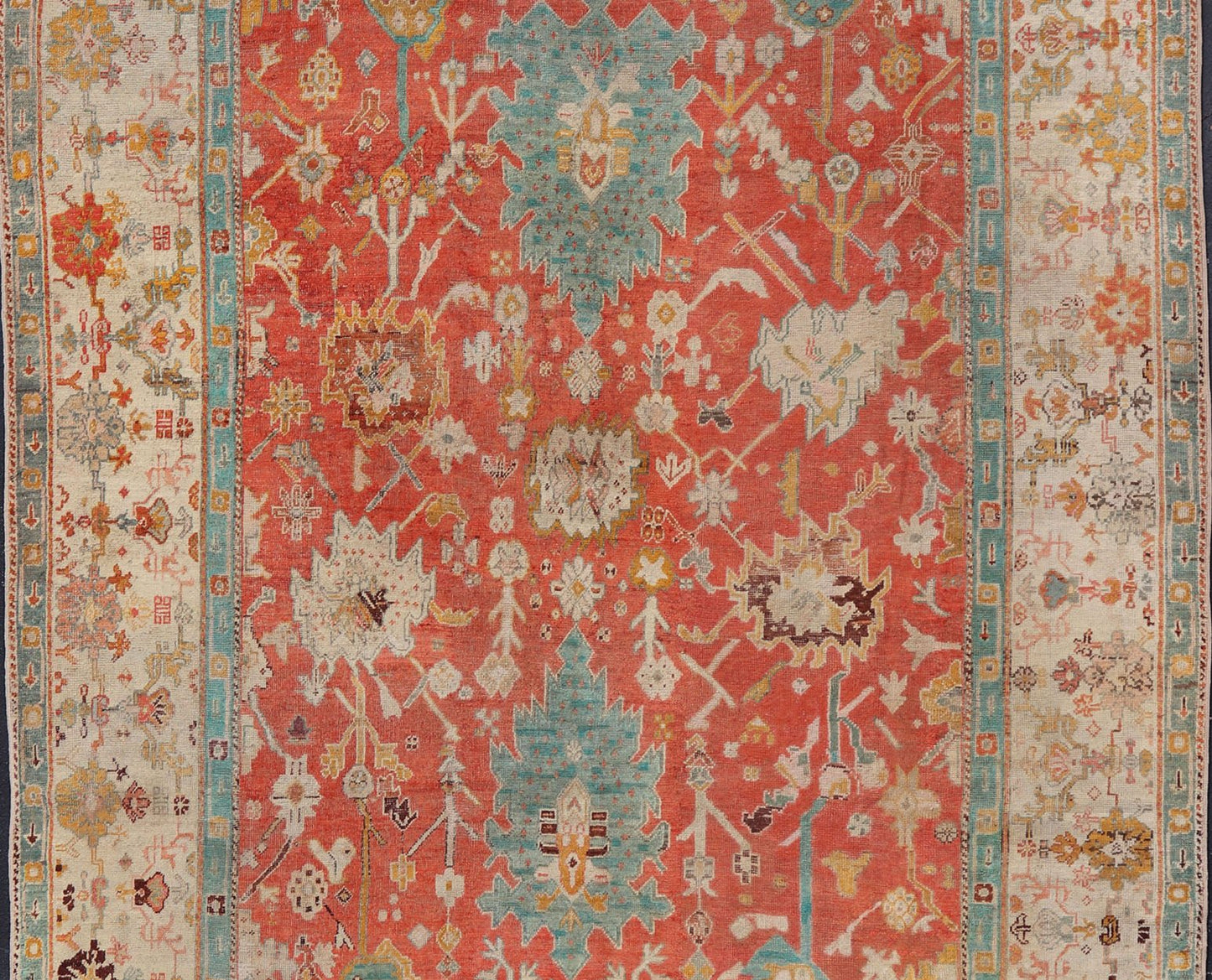 Antique Turkish Oushak In Tribal Motifs in Soft Coral, Blue, Marigold, and Cream Antique Turkish Oushak rug with tribal Medallion design in terracotta, blue, cream, and marigold. Keivan Woven Arts / rug / 17 - 1108 - K - 105, country of origin / type:... - Keivan Woven Arts17 - 1108 - K - 105 - 9272Rug
