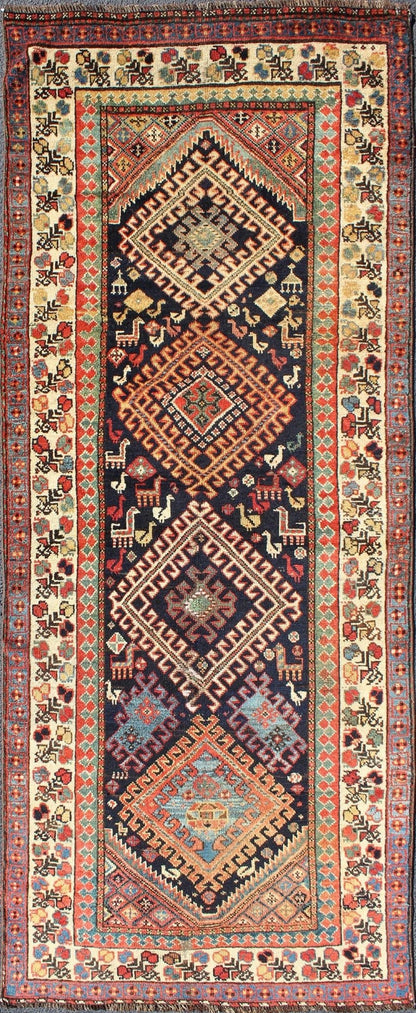 Qashqai Shiraz antique runner in multi - colors with multi - medallion geometric design. Keivan Woven Arts / rug 18 - 0406, country of origin / type: Iran / Shiraz, circa 1890. This antique Persian Shiraz rug features a unique blend of colors and an i... - Keivan Woven Arts18 - 0406 - 9388Rug