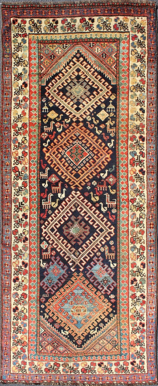 Qashqai Shiraz antique runner in multi - colors with multi - medallion geometric design. Keivan Woven Arts / rug 18 - 0406, country of origin / type: Iran / Shiraz, circa 1890. This antique Persian Shiraz rug features a unique blend of colors and an i... - Keivan Woven Arts18 - 0406 - 9388Rug