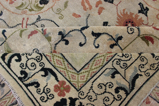 Antique Khotan Rug with Ivory Field in navy blue, coral, ivory, green, and gray. Antique Khotan rug with creamy ivory field and floral design, Keivan Woven Arts / rug 18 - 0502, country of origin / type: Turkestan / Khotan, 1930 This attrac... - Keivan Woven Arts18 - 0502 - 10072Rug