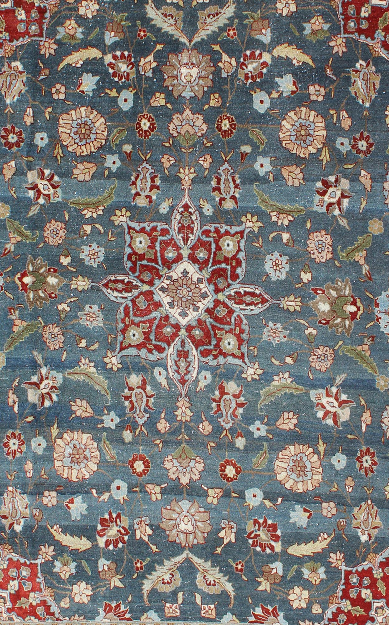 Antique Persian Tabriz Rug with Floral Medallion Design in Steel Blue & Red. Steel blue, antique Persian Tabriz rug with flowers and medallion, rug 18 - 0702, country of origin / type: Iran / Tabriz, circa 1920. This sublime and enchanting vin... - Keivan Woven Arts18 - 0702 - 10002Rug